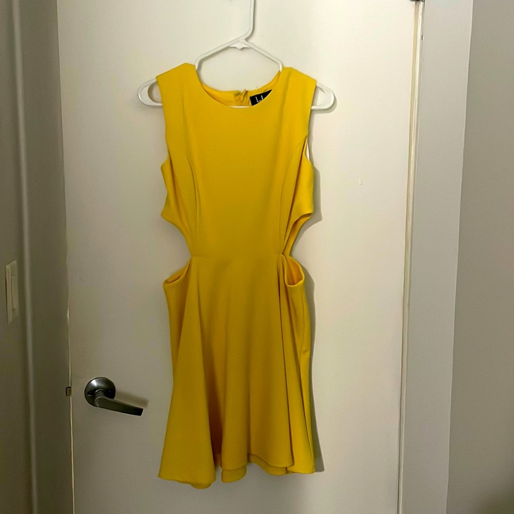 Bright yellow dress with side cut outs